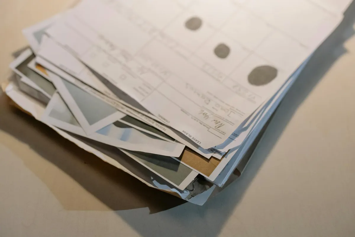 Compliance reporting documentation on a desk