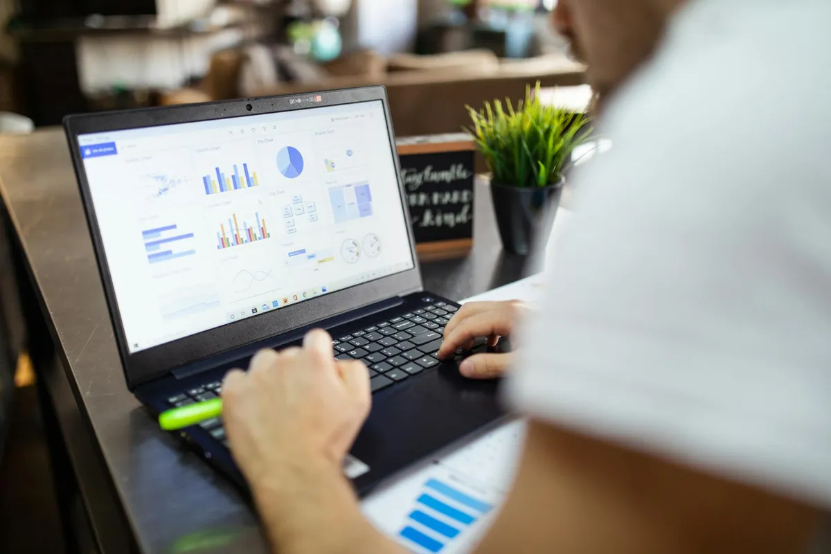 Research analysis charts and statistical data on a computer screen